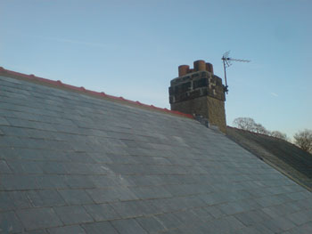 Capped red ridges to close the roof