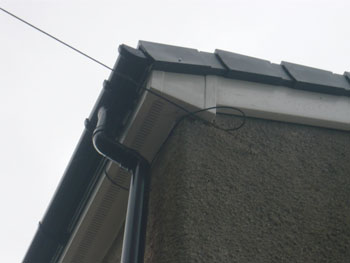 Boxing in the corners and downpipe detail
